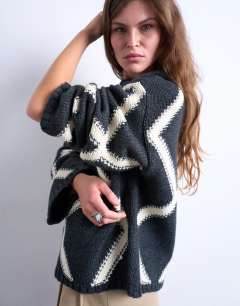 Model wearing Knitted argyle jumper in charcoal