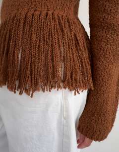 Model wearing Knitted asymmetric fringe jumper in gingerbread