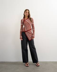 Model wearing Knitted asymmetric longline ribbed stripe top in red