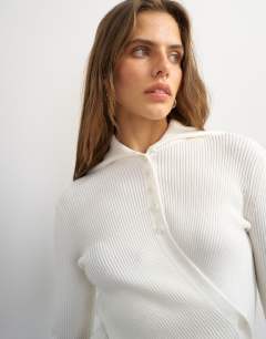 Model wearing Knitted asymmetric shawl collar jumper in ivory