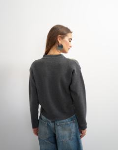 Model wearing Knitted asymmetric stripe jacket in grey multi