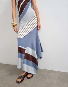 Model wearing Knitted asymmetric stripe maxi dress in blue multi