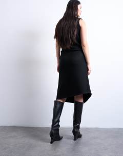 Model wearing Knitted asymmetric wrap skirt co-ord in black