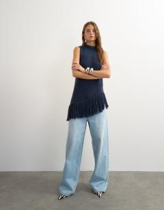 Model wearing Knitted asymmetrical fringe tunic in navy