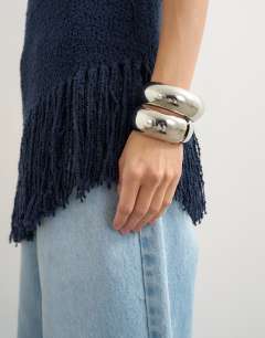Model wearing Knitted asymmetrical fringe tunic in navy