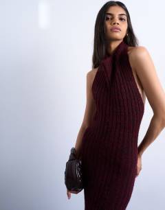 Model wearing Knitted backless halter neck dress in red