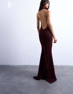 Model wearing Knitted backless halter neck dress in red