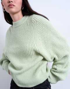 Model wearing Knitted balloon sleeve jumper in mint