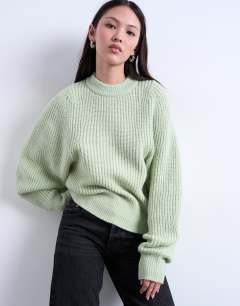 Model wearing Knitted balloon sleeve jumper in mint