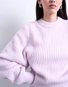 Model wearing Knitted balloon sleeve jumper in vailed pink