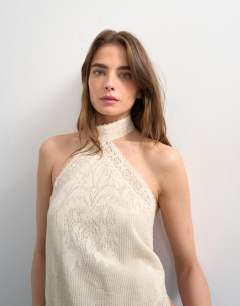 Model wearing Knitted bandana top in off white