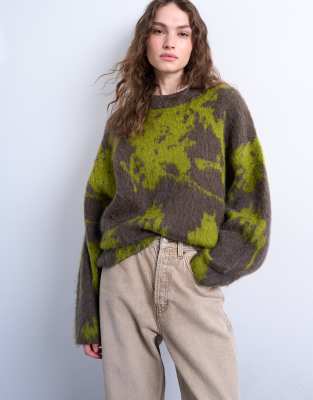 Knitted blurred floral jumper in green