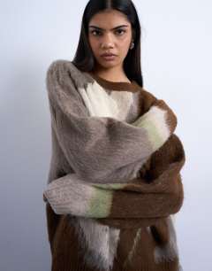 Model wearing Knitted blurred floral jumper in neutral