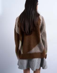 Model wearing Knitted blurred floral jumper in neutral