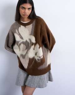 Model wearing Knitted blurred floral jumper in neutral