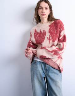 Knitted blurred floral jumper in pink