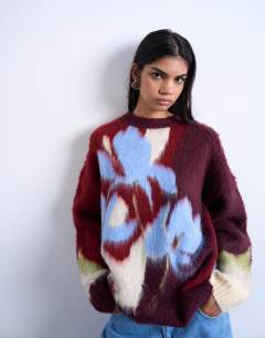 Knitted blurred flower jumper in burgundy