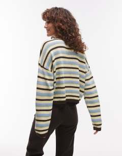 Model wearing Knitted boxy cardigan in multi stripe