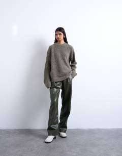 Model wearing Knitted boxy fluffy crew jumper in brown