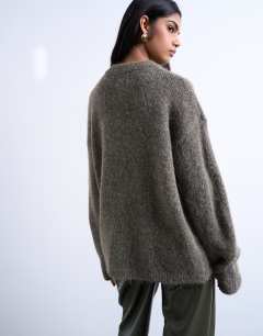 Model wearing Knitted boxy fluffy crew jumper in brown