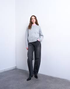 Model wearing Knitted boxy wide sleeve mid crew jumper in grey