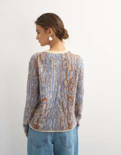 Model wearing Knitted brushed animal cardigan with wool and mohair in brown and blue