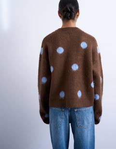 Model wearing Knitted brushed spot cardigan 