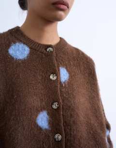 Model wearing Knitted brushed spot cardigan 