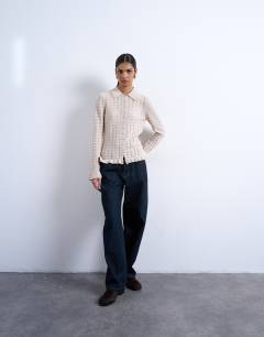 Model wearing Knitted button through frill top in oat