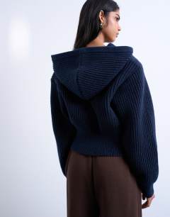 Model wearing Knitted button through shoulder padded hoodie in Navy