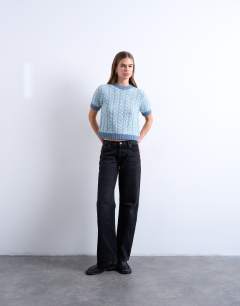 Model wearing Knitted cable detail short sleeve top in light blue