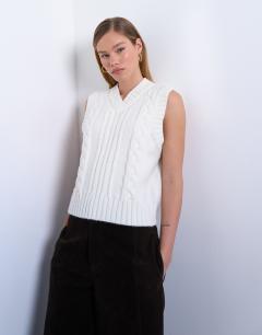 Model wearing Knitted cable v neck vest in ivory