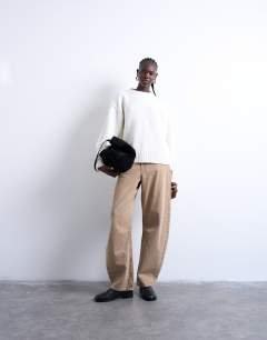 Model wearing Knitted clean exposed seam jumper in White