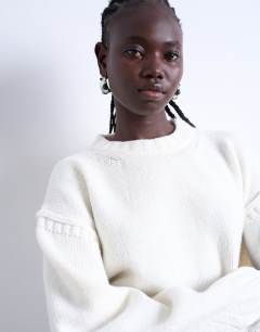 Model wearing Knitted clean exposed seam jumper in White