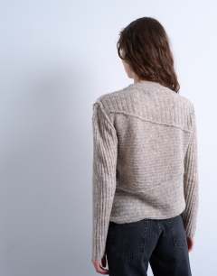 Model wearing Knitted co-ord asymmetric top in oat