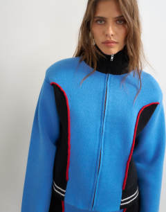 Model wearing Knitted co-ord shoulder padded seam detail jacket in blue