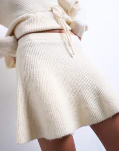 Model wearing Knitted co-ord skirt in ivory