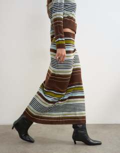 Model wearing Knitted co-ord striped full hem maxi skirt in burgundy multi