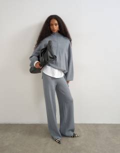 Model wearing Knitted co-ord tie detail trouser in grey