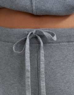 Model wearing Knitted co-ord tie detail trouser in grey