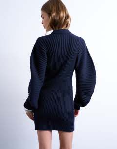Model wearing Knitted cocoon ribbed dress in navy