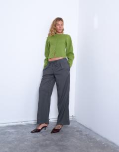Model wearing Knitted compact balloon sleeve cardigan in green