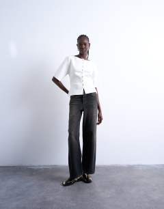 Model wearing Knitted compact cardigan in ecru