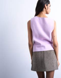 Model wearing Knitted compact waistcoat in lilac