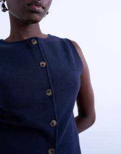 Model wearing Knitted compact waistcoat in Navy