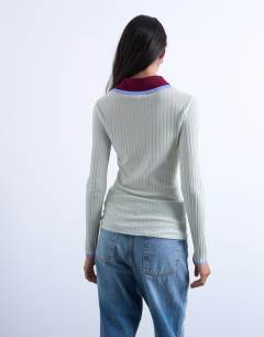 Model wearing Knitted contrast collar sheer rib polo in mint