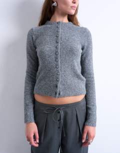 Model wearing Knitted covered button cardigan in grey