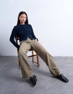 Model wearing Knitted covered button cardigan in navy