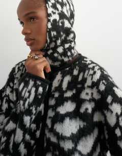Model wearing Knitted crew neck cardigan with scarf in mono animal print