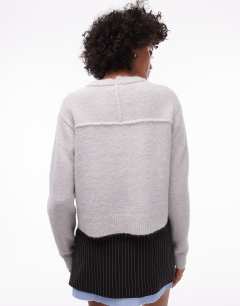 Model wearing Knitted crew with raglan and exposed seam jumper in light grey